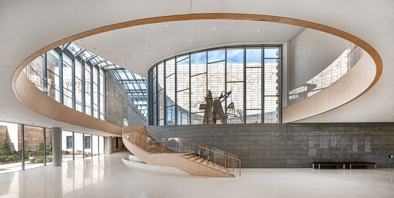 The Phillip G. Schrager Atrium with large wooden staricase created by RCS.